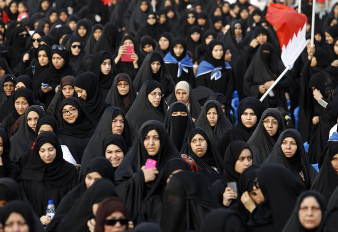 Protesters holding Bahraini flags participate in an anti-government sit-in organized by Bahrain's main opposition party Al Wefaq in the village of Sitra, south of Manama, May 3, 2013. (Reuters/Hamad I Mohammed)