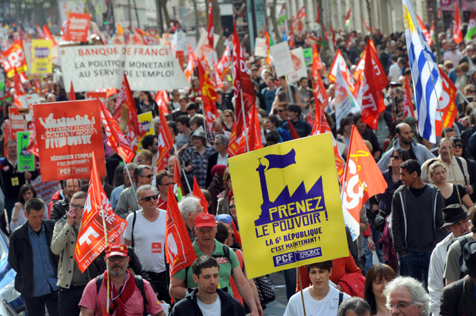  People take part in a demonstration on May 5, 2013 in Paris, called by Jean-Luc Melenchon, leader of Front de Gauche (Left Front) left wing party, to protest "against the austerity, against the finance and to ask for a Sixth Republic". (AFP Photo)