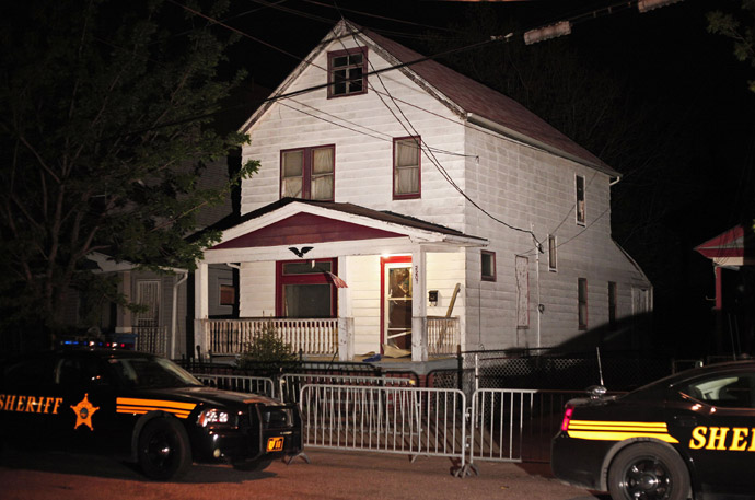 A general view of the exterior of the house where, on Monday, three women who had disappeared as teenagers approximately ten years ago were found alive on May 7, 2013 in Cleveland, Ohio. (Bill Pugliano/Getty Images/AFP)