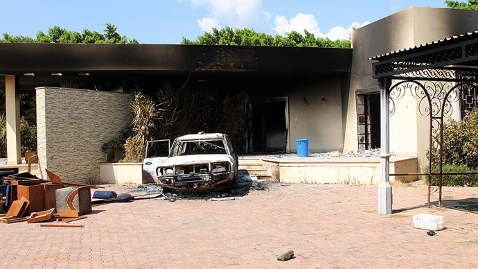 A burnt house and a car are seen inside the US Embassy compound on September 12, 2012 in Benghazi.(AFP Photo / Stringer)