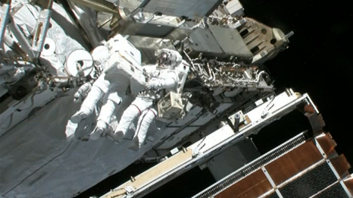 ISS crew fixes coolant leak during spacewalk — RT World News