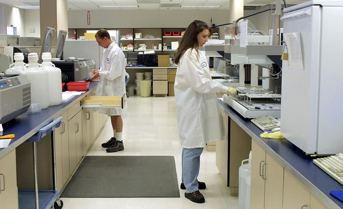  Lab technicians for Myriad Genetics of Salt Lake City, Utah work on DNA samples (AFP Photo/George Frey)