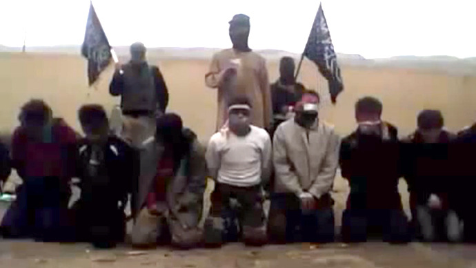 Rebels film execution of 11 Syrian soldiers, as Obama continues anti-Assad rhetoric