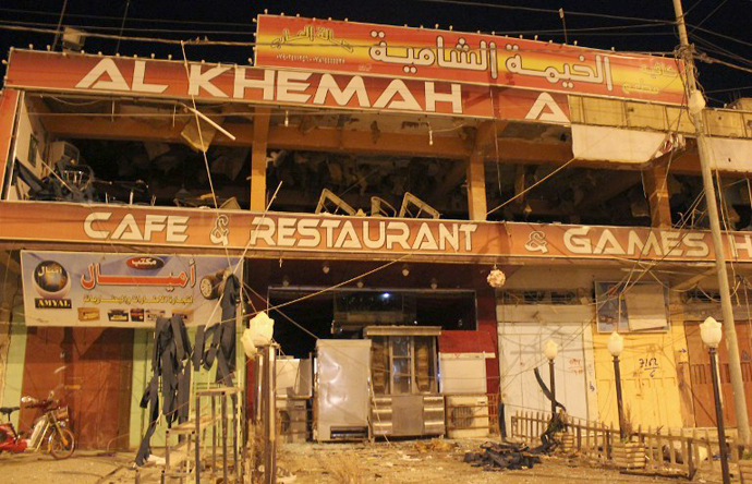 A picture shows a coffee shop that was damaged following a bomb blast in Fallujah, west of Baghdad, on May 17, 2013. (AFP Photo / Azhar Shallal)