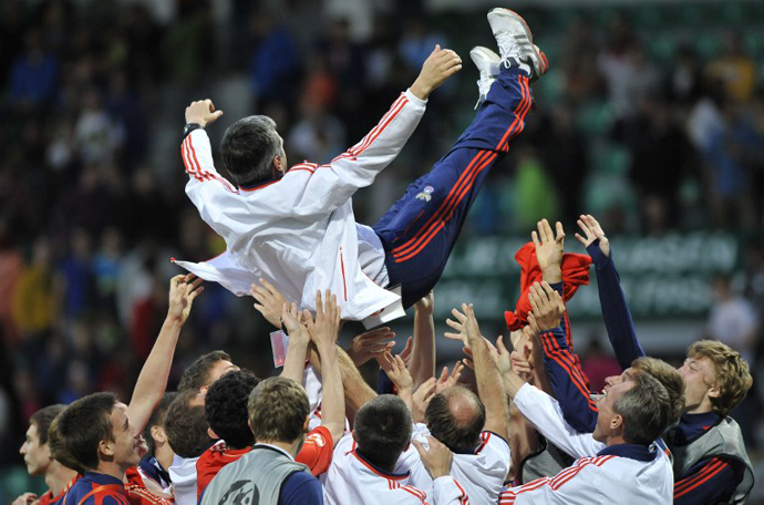 Russia's team celebrates after the UEFA European Championship final match Italy vs Russia on May 17, 2013 in Zilina. Russia won 5-4. (AFP Photo / Samuel Kubani)