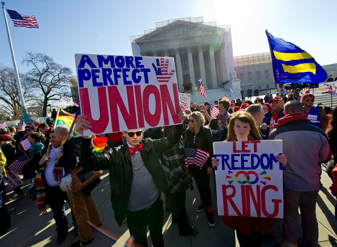 Gay marriage supporters march at the US Supreme Court on March 27, 2013 in Washington, DC. (AFP Photo / Karen Bleier)