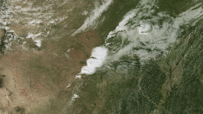 This image obtained May 21, 2013 and acquired at 2:55 CT on May 20, 2013, from the National Oceanic and Atmospheric Administration (NOAA)GOES-13 satellite shows the storms developing directly over central Oklahoma (AFP Photo / NOAA)