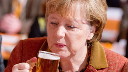 Beer buddies: Merkel sends Putin bottles of German booze, Russian leader reveals