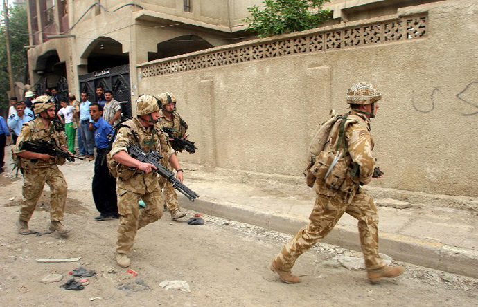 British troops race to secure the area in the southern city of Basra, 550 kms south of Baghdad. (AFP Photo / Essam Al-Sudani)