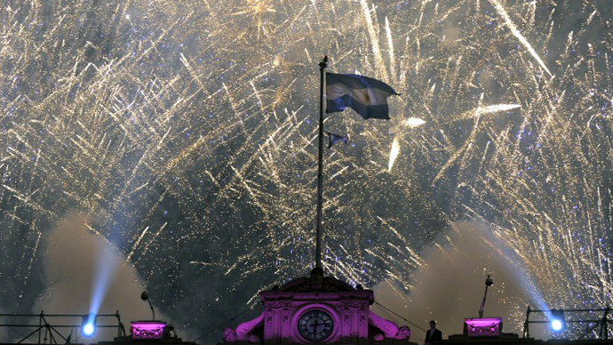 Fireworks explode at Plaza de Mayo square in Buenos Aires on May 25, 2013 during the celebration of the 10th anniversary of the "Frente para la Victoria" as ruling party. (AFP Photo / Alejandro Pagni)