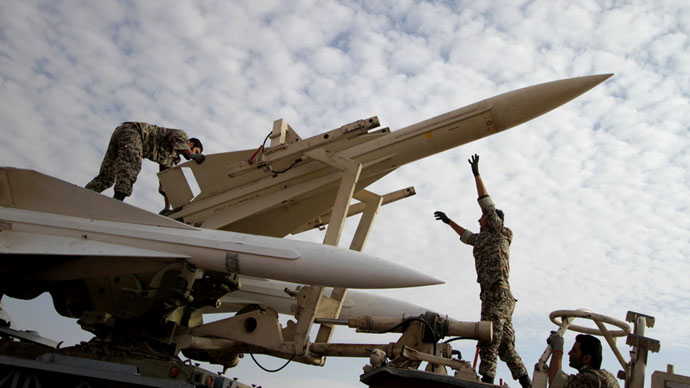 Iranian soldiers prepare to launch a Hawk surface-to-air missile during military maneuvers at an undisclosed location in Iran.(AFP Photo / Amin Khoroshahi)