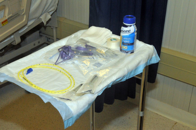 Feeding chair and internal nourishment preparation inside the Joint Medical Group where the detainees receive medical care, Naval Station Guantanamo Bay, Cuba, April 10, 2013. (Image from publicintelligence.net / photo By Army Sgt. Brian Godette)