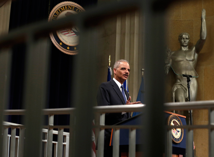 U.S. Attorney General Eric Holder speaks during a special naturalization ceremony at the Department of Justice in Washington May 28, 2013 (Reuters / Kevin Lamarque)