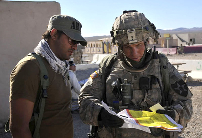 This August 23, 2011 photograph obtained courtesy of the Defense Video & Imagery Distribution System (DVIDS) shows Staff Sgt. Robert Bales (L) at the National Training Center in Fort Irwin, California (AFP Photo / DVIDS / Spc. Ryan Hallock)