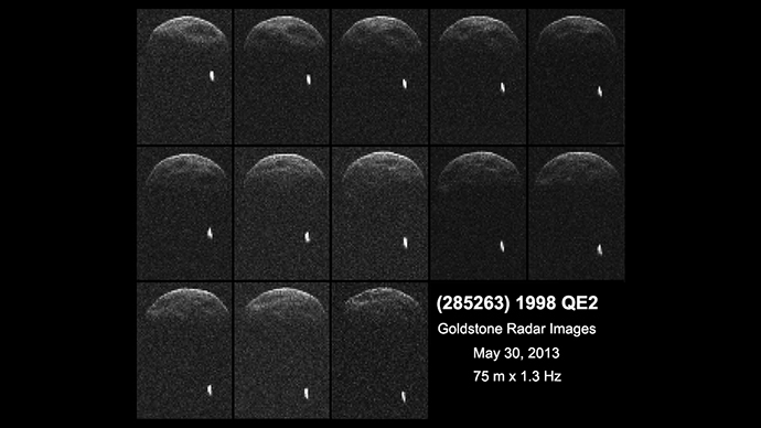 First radar images of asteroid 1998 QE2 were obtained when the asteroid was about 3.75 million miles (6 million kilometers) from Earth. The small white dot at lower right is the moon, or satellite, orbiting asteroid 1998 QE2. Image credit: NASA/JPL-Caltech/GSSR 