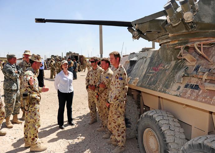 Australia's Prime Minister Julia Gillard meets members of the Australian Army 1st Mentoring Task Force during her visit to Multinational Base Tarin Kowt in southern Afghanistan October 2, 2010 (Reuters / Department of Defence / Handout) 