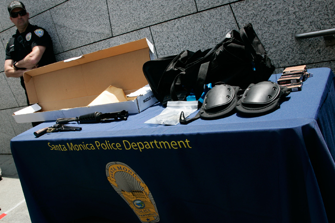 Weapons and gear used by the shooting suspect in Friday's crime spree is put on display for the media by the Santa Monica Police Department in Santa Monica, California, June 8, 2013 (Reuters / Jonathan Alcorn) 