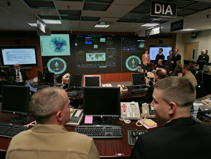 Experts man their stations at the Threat Operations Center inside the National Security Agency (NSA) in suburban Fort Mead, Maryland (AFP Photo)