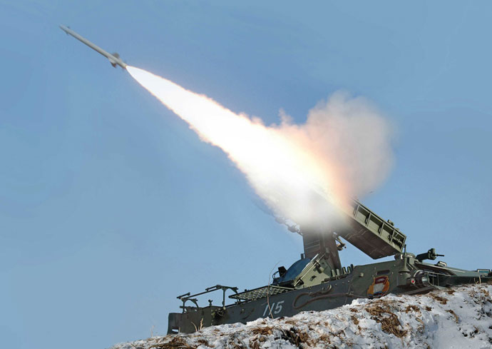This picture taken by North Korea's official Korean Central News Agency on March 20, 2013 shows a self-propelled suface to air missile during a live military drill overseen by North Korean leader Kim Jong-Un at an undisclosed location. Kim Jong-Un oversaw a live fire military drill using drones and cruise missile interceptors, state media said on March 20, amid heightened tensions on the Korean peninsula.(AFP Photo / KCNA via KNS)