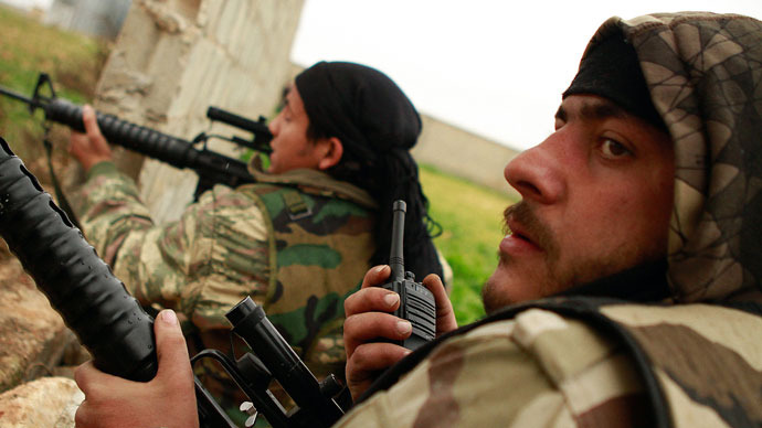 Britain arming Syrian rebels would face MP vote
