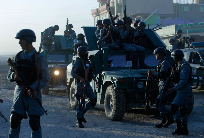 Afghan police arrive at the site of an attack in Kabul June 10, 2013.(Reuters / Omar Sobhani)