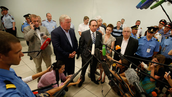 Human rights representatives (L-R) Amnesty international Russia Director Sergei Nikitkin, lawyer Anatoly Kucherena, Duma Deputy Vyacheslav Nikonov, lawyer Henri Reznik, Member of the Public Chamber of Russia Olga Kostina and Russian human rights commissioner Vladimir Lukin speaks to journalists after a meeting with former intelligence agency contractor Edward Snowden at Sheremetyevo airport July 12, 2013.(Reuters / Grigory Dukor)