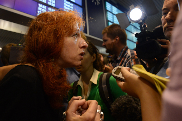 Tanya Lokshina, Deputy Director of Human Rights Watch's Moscow office, speaks with journalists before his meeting with US National Security Agency (NSA) fugitive leaker Edward Snowden inside the terminal F of Moscow's Sheremetyevo airport, on July 12, 2013 (AFP Photo / Kirill Kudryavtsev) 