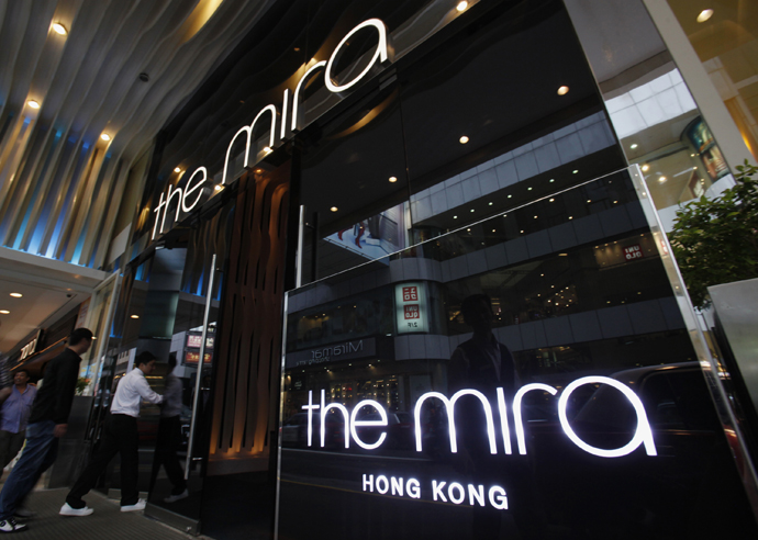 Visitors walk into The Mira Hotel, where 29-year-old former CIA employee Edward Snowden was reported to have checked out of on Monday, in Hong Kong June 10, 2013. (Reuters / Bobby Yip)