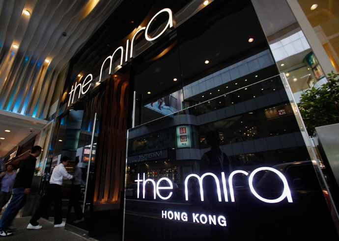 Visitors walk into The Mira Hotel, where 29-year-old former CIA employee Edward Snowden was reported to have checked out of on Monday, in Hong Kong June 10, 2013 (Reuters / Bobby Yip)