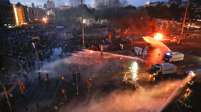 Tear gas and bulldozers: Istanbul riot police clear Gezi Park protest camp