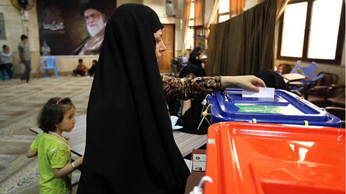 ‘We don’t give a damn about US’: Iran votes for new president amid criticism