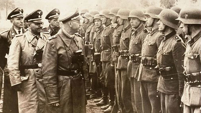 Heinrich Himmler, center, as he reviews troops of the Galician SS-Volunteer Infantry Division, June 3, 1944.(Photo from Holocaust Memorial Museum)