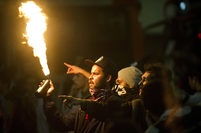 Students protest in downtown Sao Paulo, Brazil on June 13, 2013, against a recent rise in public bus and subway fare from 3 to 3.20 reais (1.50 USD). (AFP Photo/Nelson Almeida)