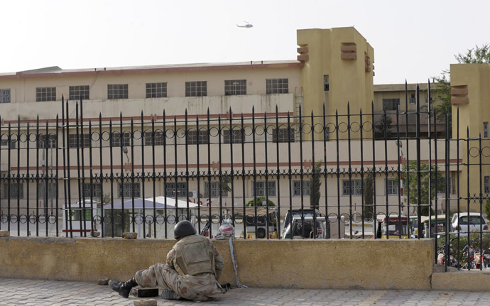 A Pakistani paramilitary soldier looks after militants attacked a hospital in Quetta, the capital of Baluchistan province, on June 15, 2013. (AFP Photo)