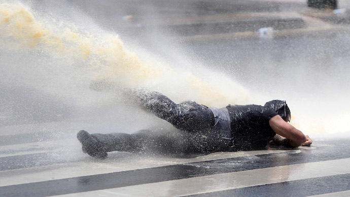 Ankara police block activist funeral cortege, raid memorial protest with tear gas