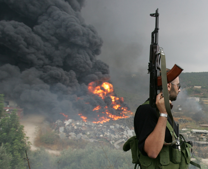 A Lebanese Hezbollah guerrilla (Reuters / Issam Kobeisi)