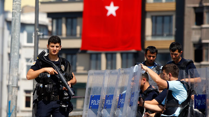 Turkish police stand guard at the entrance of Gezi Park at Taksim Square in Istanbul.(Reuters / Marko Djurica)