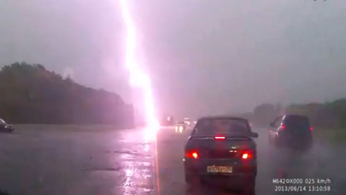 Caught on dash cam: Lightning hits mother and her child on highway