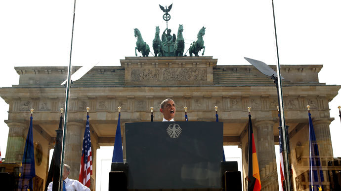 From behind a bullet-proof glass, U.S. President Barack Obama speaks in front of the Brandenburg Gate in Berlin, Germany June 19, 2013. (Reuters / Kevin Lamarque)