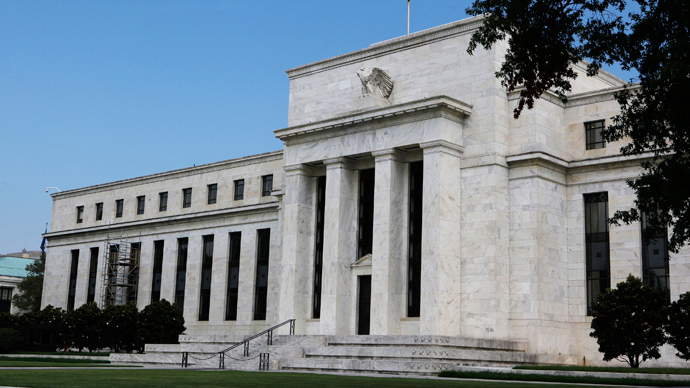 US Fed's plan to end bond purchases drags markets down