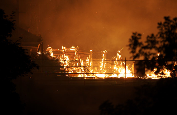 A fire blazes at Riga Castle on June 20, 2013 in Riga, Latvia. (AFP Photo)