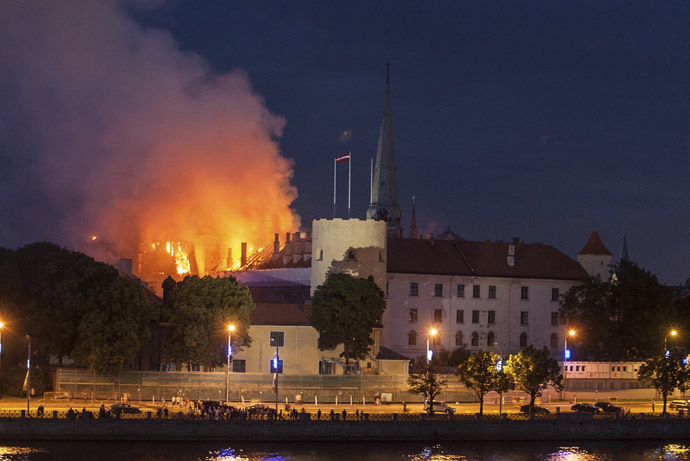 A view of the fire at the Riga castle June 20, 2013. According to media reports, the cause of the fire, which started on Thursday night, is unknown. (Reuters/Dmitrijs Sulzics)