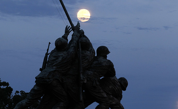 The largest full moon of 2013, also referred to as a "super moon," rises over the Iwo Jima memorial in Arlington, Virginia, near Washington, June 22, 2013. (Reuters / Jason Reed)