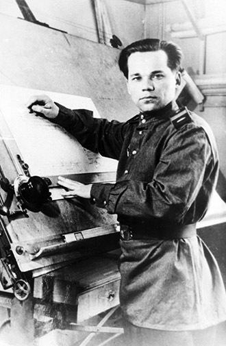 Senior Sergeant Mikhail Kalashnikov as he designed his AK-47 assault rifle, 1947 (RIA Novosti)