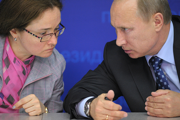 Russian President Vladimir Putin and Elvira Nabiullina having a conversation at meeting. (RIA Novosti / Alexei Druzhinin)