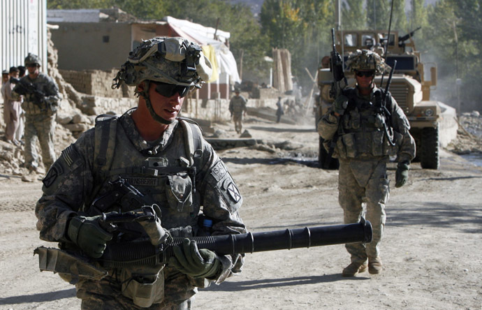 Soldiers from the U.S. Army's Bravo Company, 1 battalion, 32nd Infantry, of the 10th Mountain Division based in Fort Drum, New York, patrol in Pengram district, Logar province (Reuters)