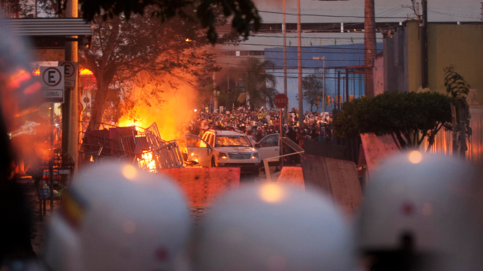 Brazilians clash with police as MPs seek to soothe protest with anti-corruption bill