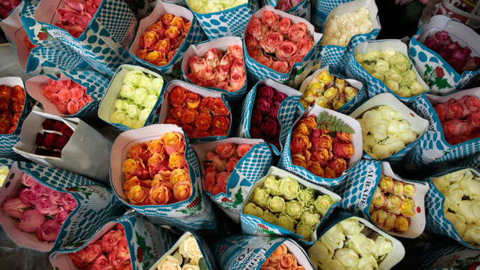 Bunches of roses from Ecuador are stacked for delivery at Liberty Wholesale in the flower market.(Reuters / Lucy Nicholson)