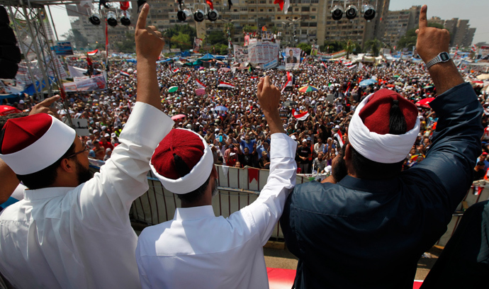 Clerics supporting deposed Egyptian President Mohamed Mursi attend a rally at the Raba El-Adwyia square where Mursi's supporters are camping, in Cairo August 2, 2013 (Reuters / Mohamed Abd El Ghany)