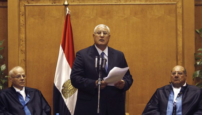 Adli Mansour (C), Egypt's chief justice and head of the Supreme Constitutional Court, speaks at his swearing in ceremony as the nation's interim president in Cairo July 4, 2013, a day after the army ousted Mohamed Morsi as head of state. (Reuters/Amr Abdallah Dalsh)